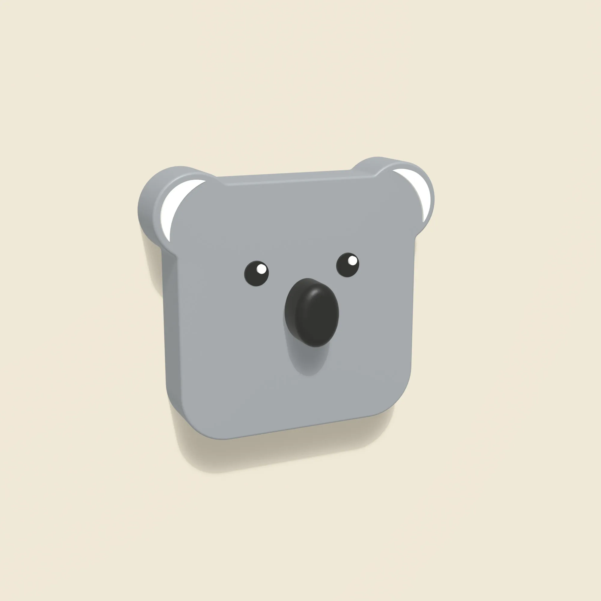 Cache interrupteur koala posé au mur sur un interrupteur Odace